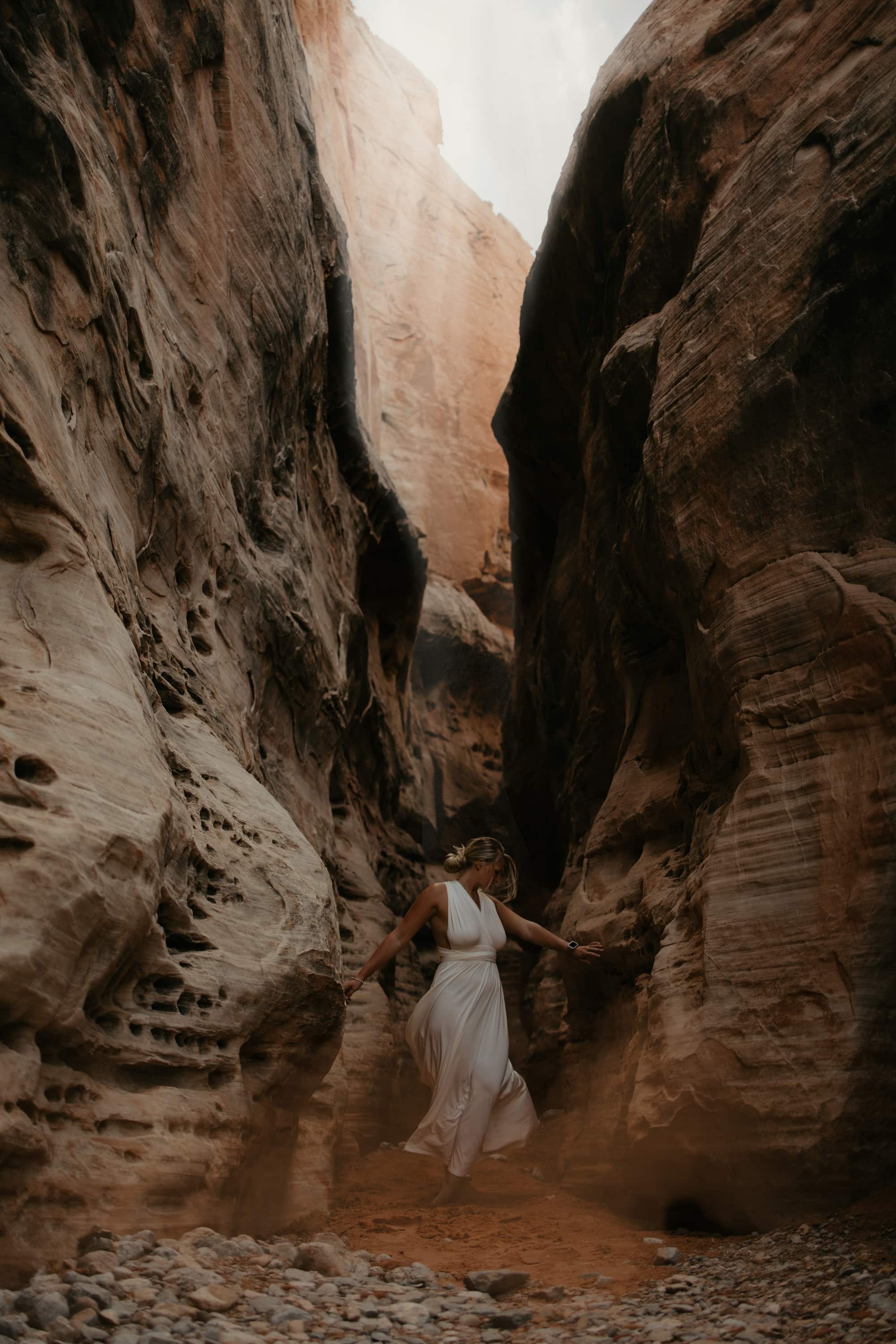 Bride dancing in a slot canyon in Valley of Fire, Nevada