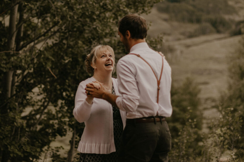 Mother-Son wedding dance at the base of Rocky Mountains in Colorado