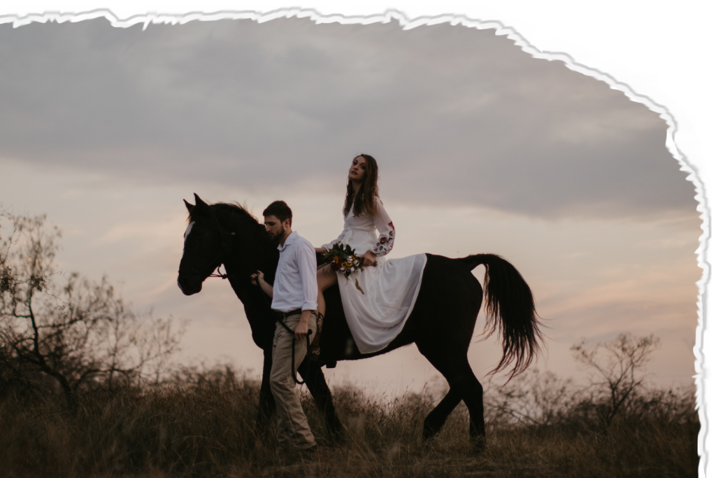 Groom leading bride on horseback