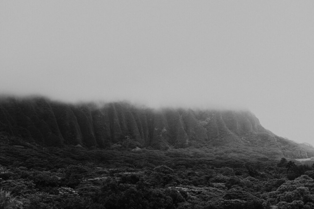 Black and white of fog rolling over Hawaii mountainside